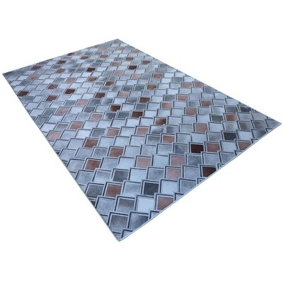 Walk on Me Faux Cowhide Frames of Mind Loomed Area Rug