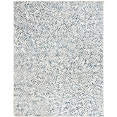 Soho SOH125 Hand Tufted Indoor Rug - Safavieh