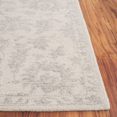 Ebony EBN905 Handmade Tufted Rug - Safavieh