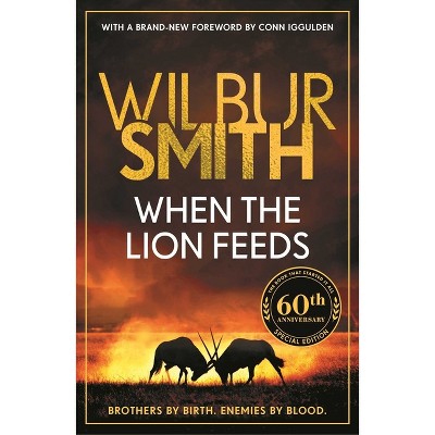 When the Lion Feeds - (Courtney Series: The When the Lion Feeds Trilogy) by  Wilbur Smith (Paperback)