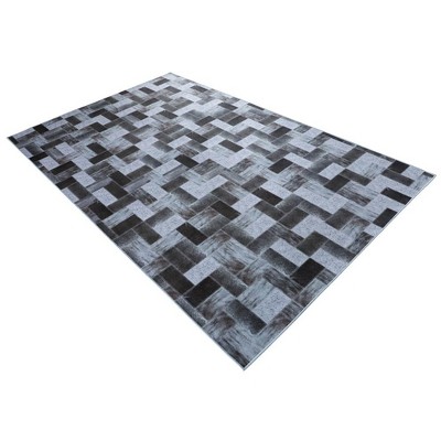Walk on Me Faux Cowhide Off the Blocks Loomed Area Rug