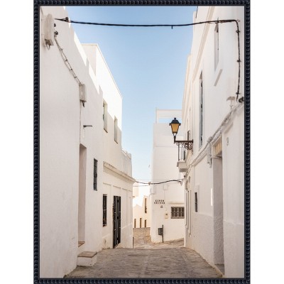 Amanti Art The White town of Vejer de La Frontera by Raisa Zwart Framed Canvas Wall Art