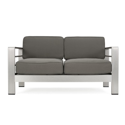 Christopher Knight Home Cape Coral 56" Outdoor Aluminum Loveseat with Cushions, Silver/Khaki