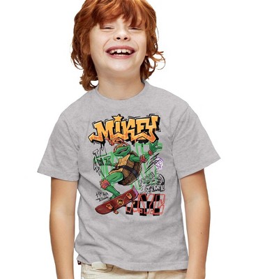 Teenage Mutant Ninja Turtles: Mutant Mayhem Skater Mikey Kids T Shirt For Youth  Athletic Heather