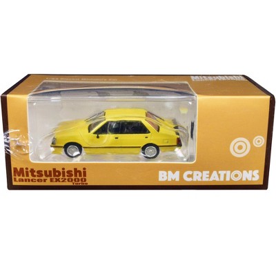 Mitsubishi Lancer EX2000 Turbo Yellow with Stripes with Extra Wheels 1/64 Diecast Model Car by BM Creations